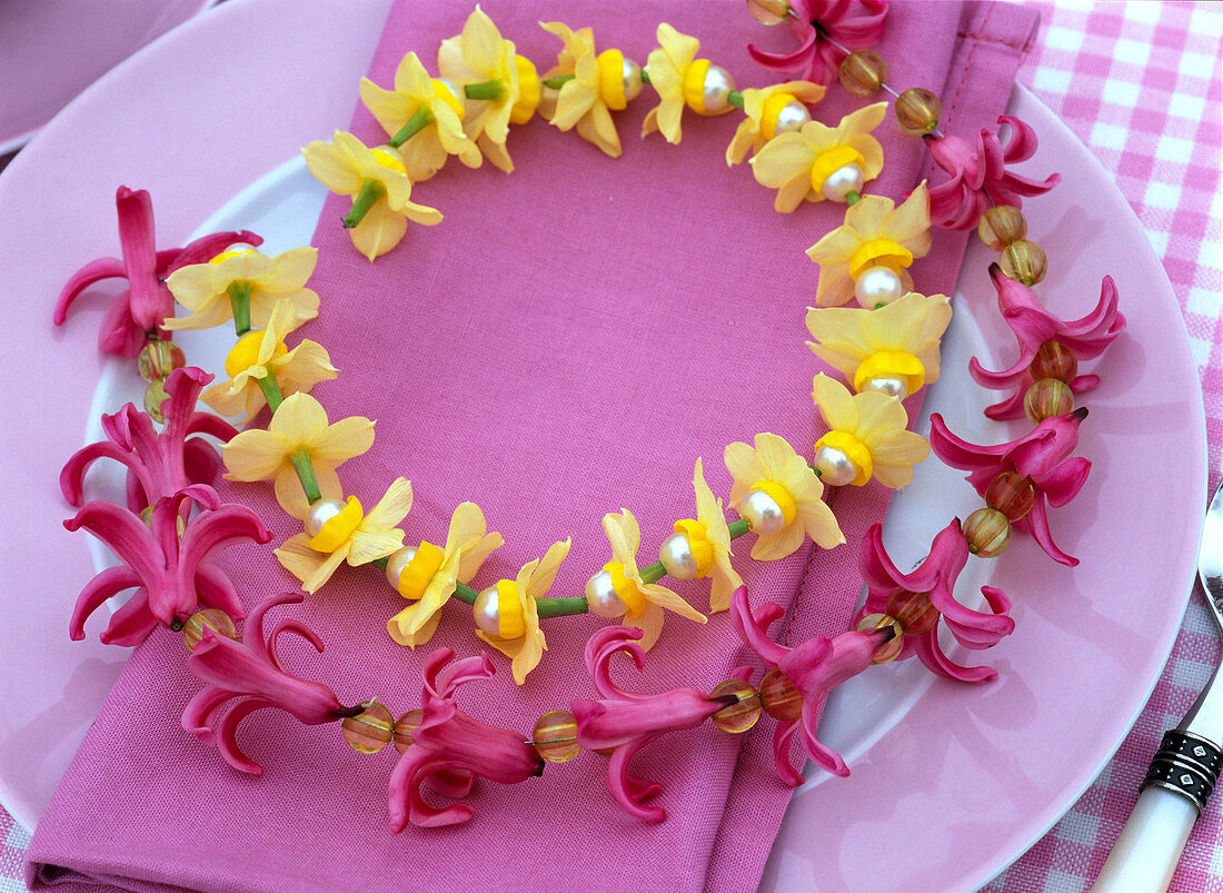 Wreaths of flowers of Hyacinthus (hyacinths, pink), Narcissus