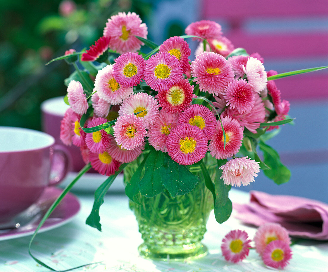 Bouquet of bellis and grasses made of green relief glass