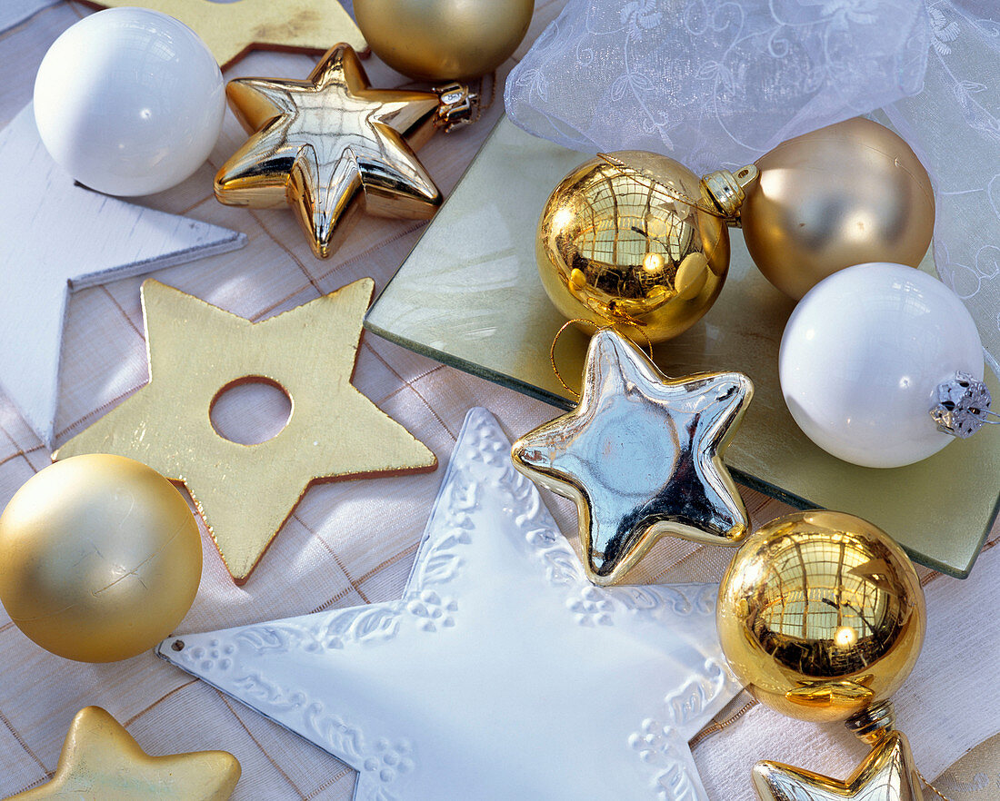 Christmas tree decorations in gold and white