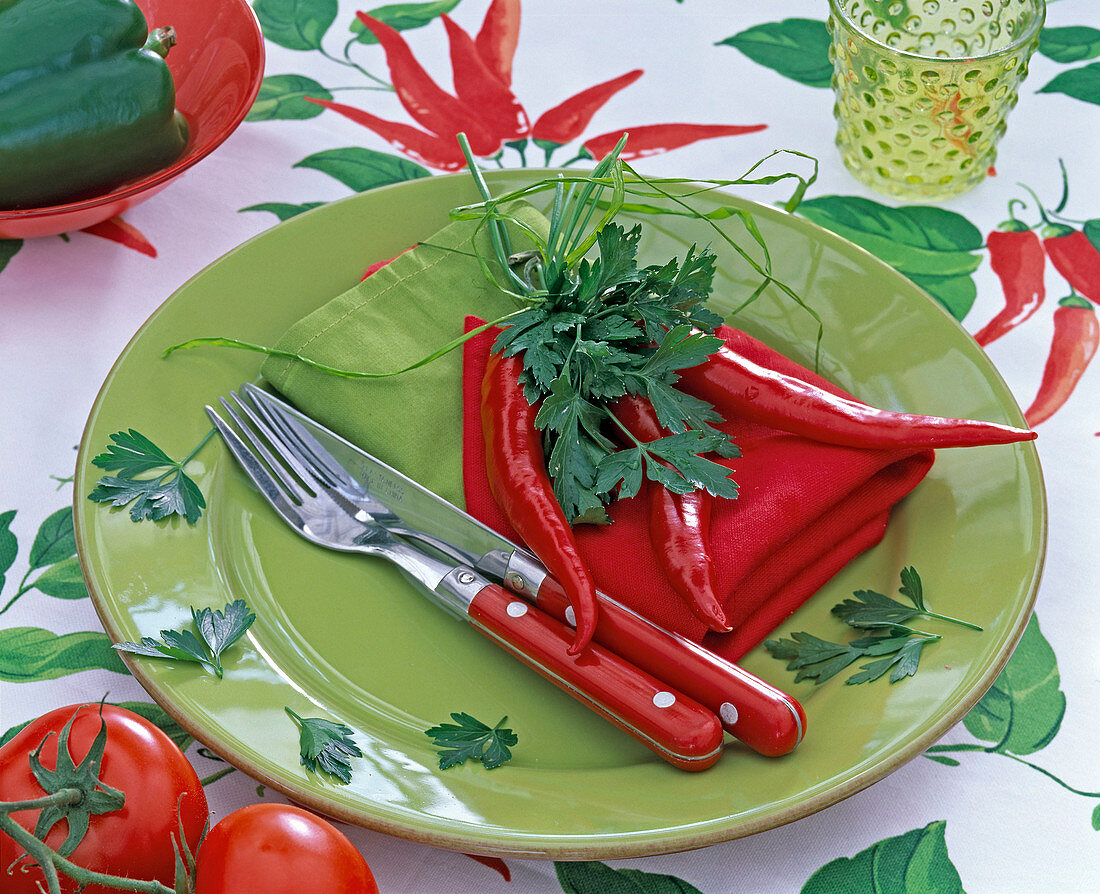 Plate decoration with hot peppers and parsley
