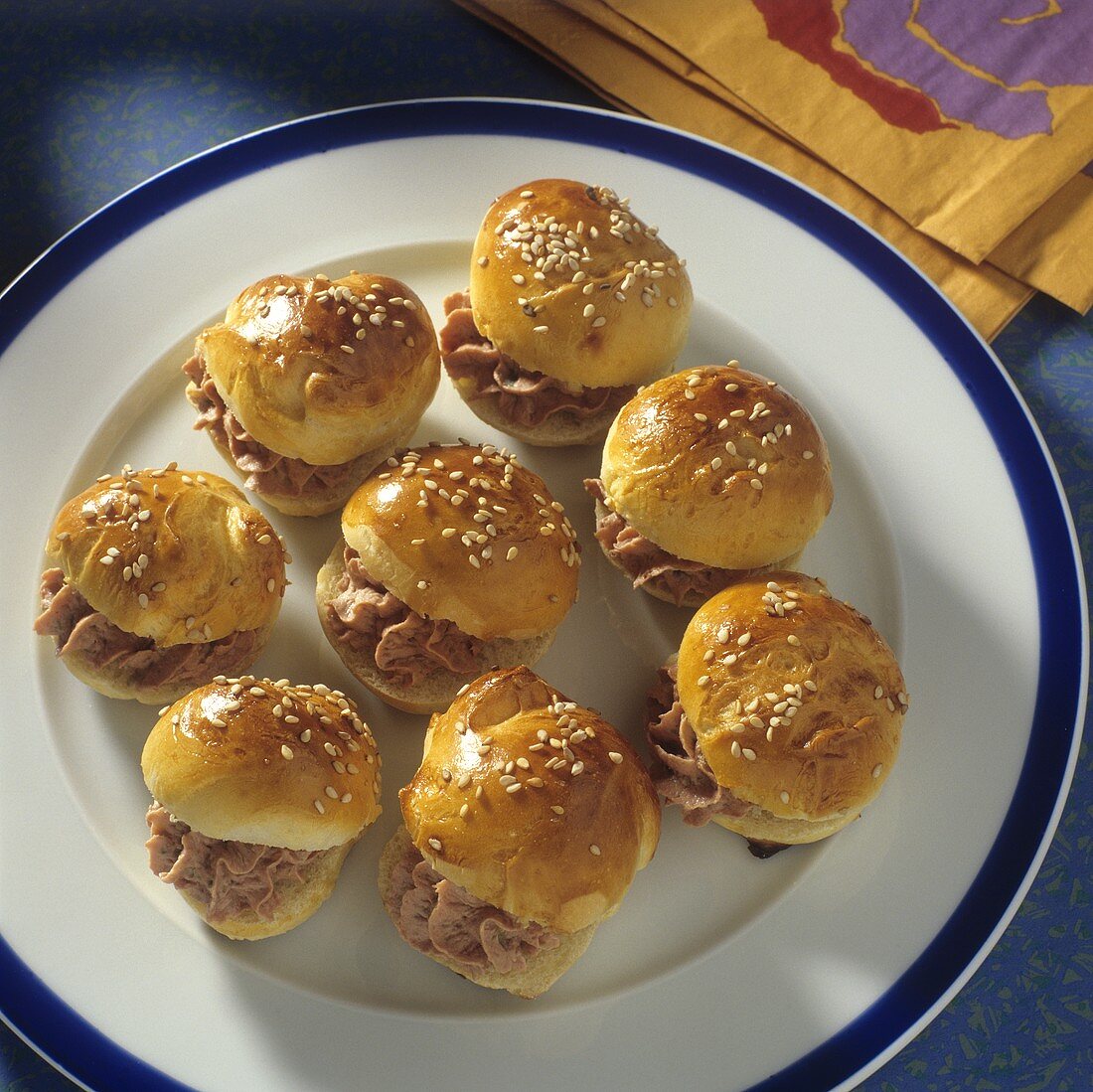 Small Cocktail Sandwiches with Liver Sausage on Plates