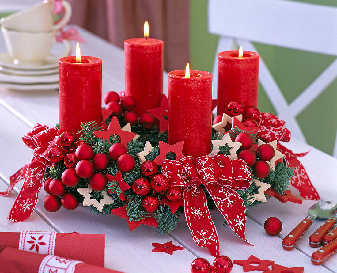 Advent wreath with Abies procera, red candles, red balls