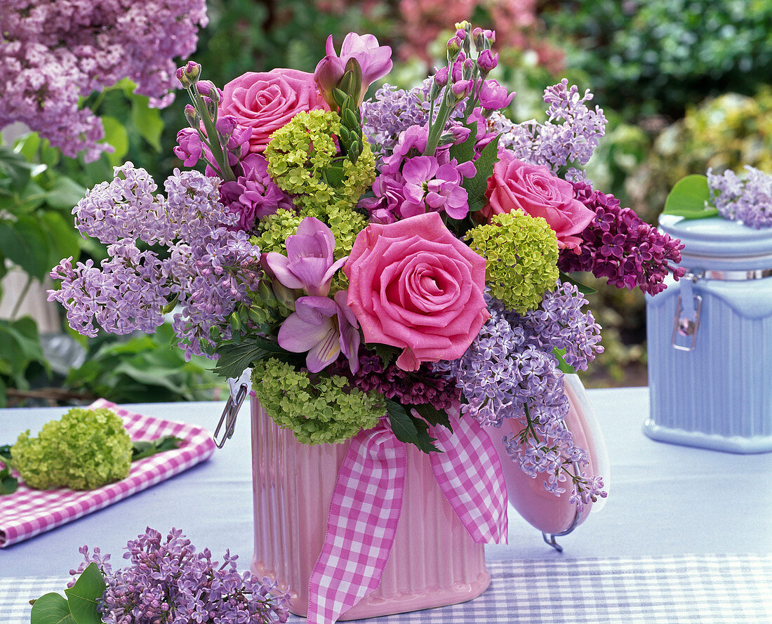 Bouquet of Rose, syringa, viburnum