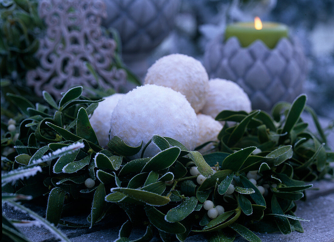 Wreath of Viscum (mistletoe) with Christmas tree balls in hoarfrost