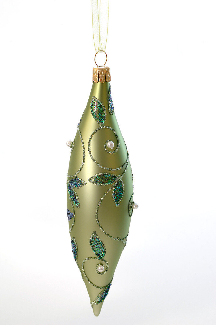Green Christmas tree ornaments with tendril motif, free-standing