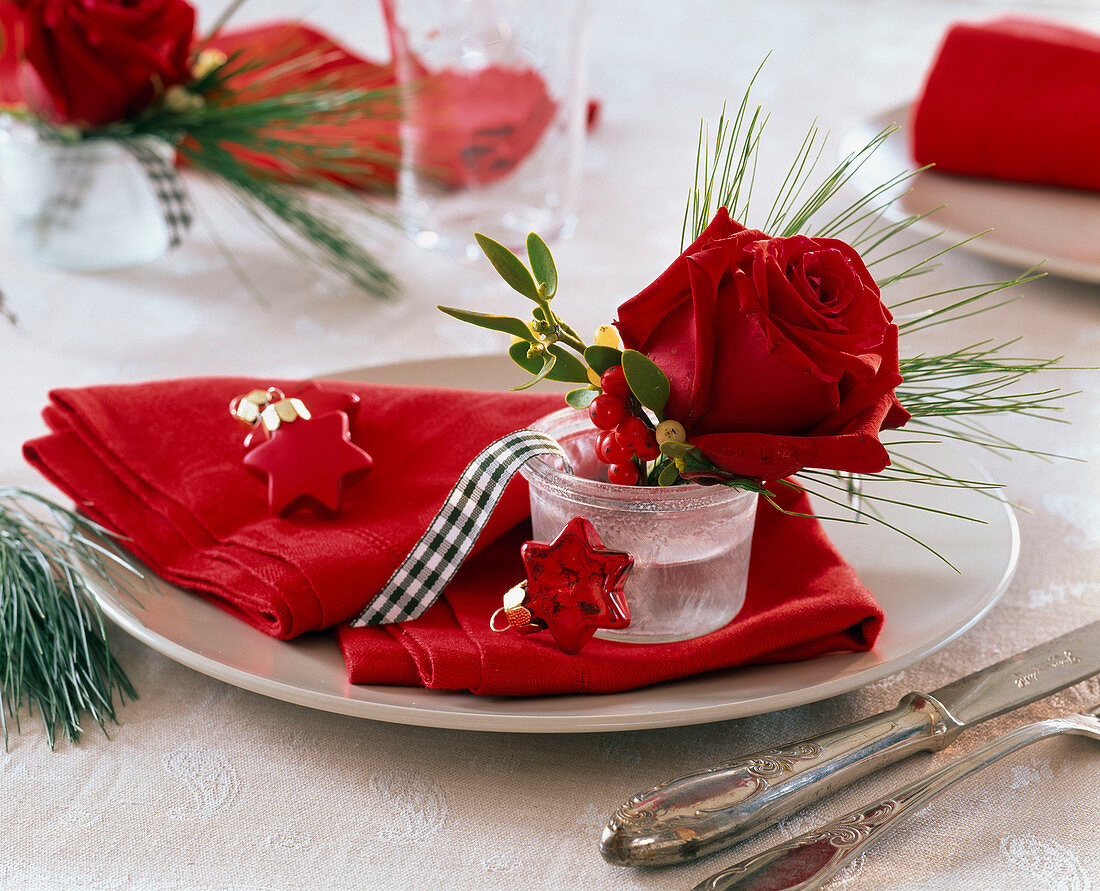 Small jar with pink (rose), holly (red winterberry)