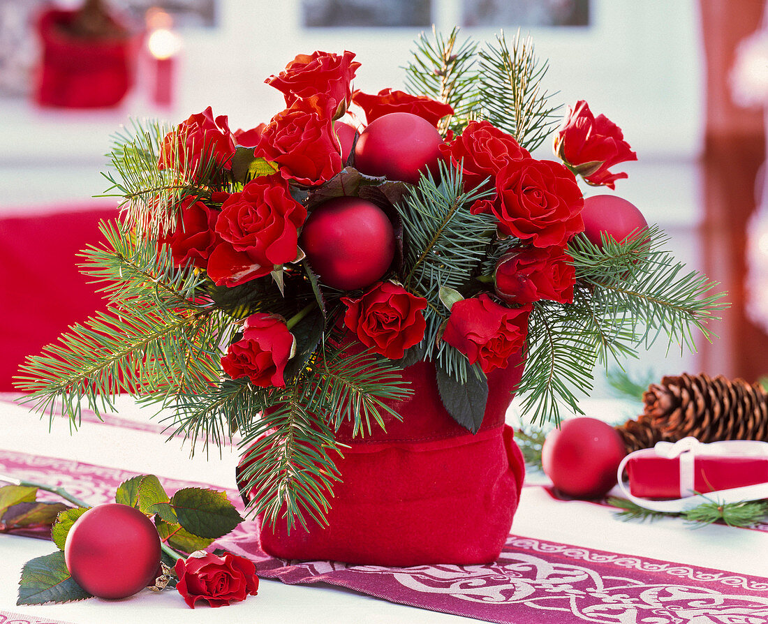 Bouquet of Rosa (roses), Pseudotsuga (Douglas fir), Christmas tree balls