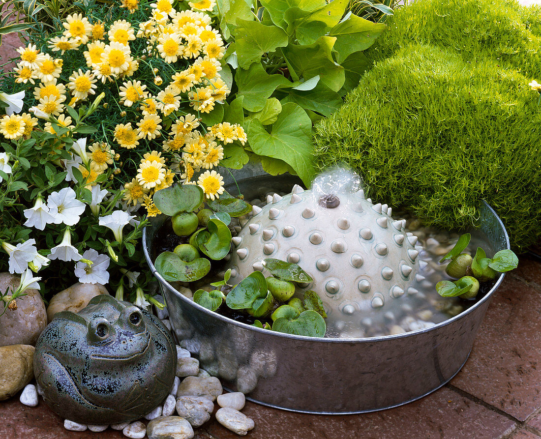 Small water feature: Zinc bowl with ceramic hemisphere, gravel