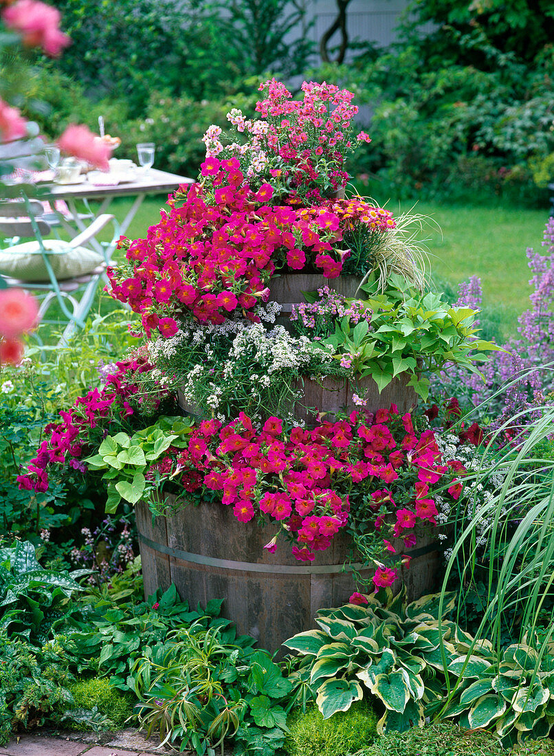 Barrel tower planted with balcony flowers