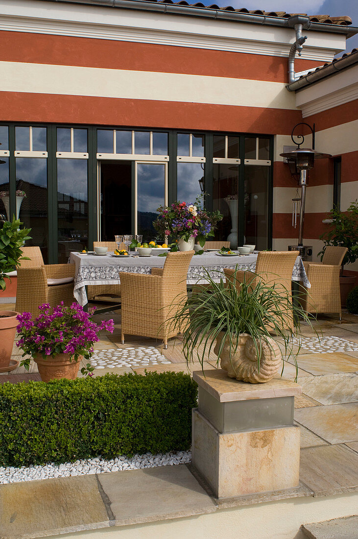 Terrace at the house with large seating area and patio heater