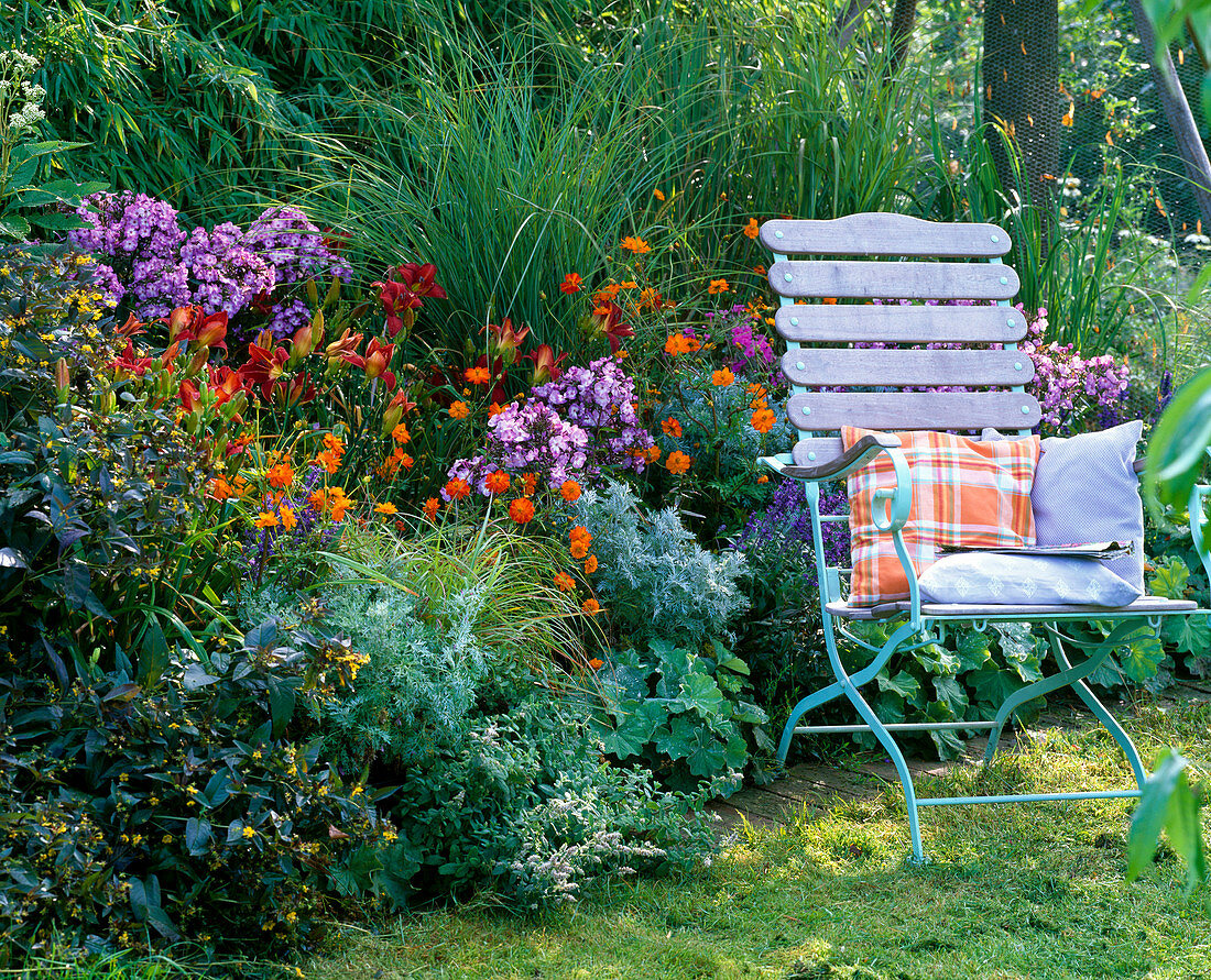 Bed with perennials and summer flowers