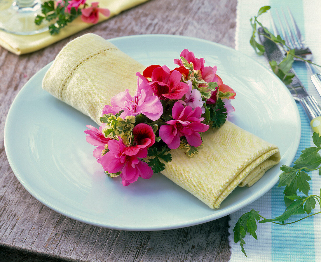 Pelargonium napkin ring around napkin