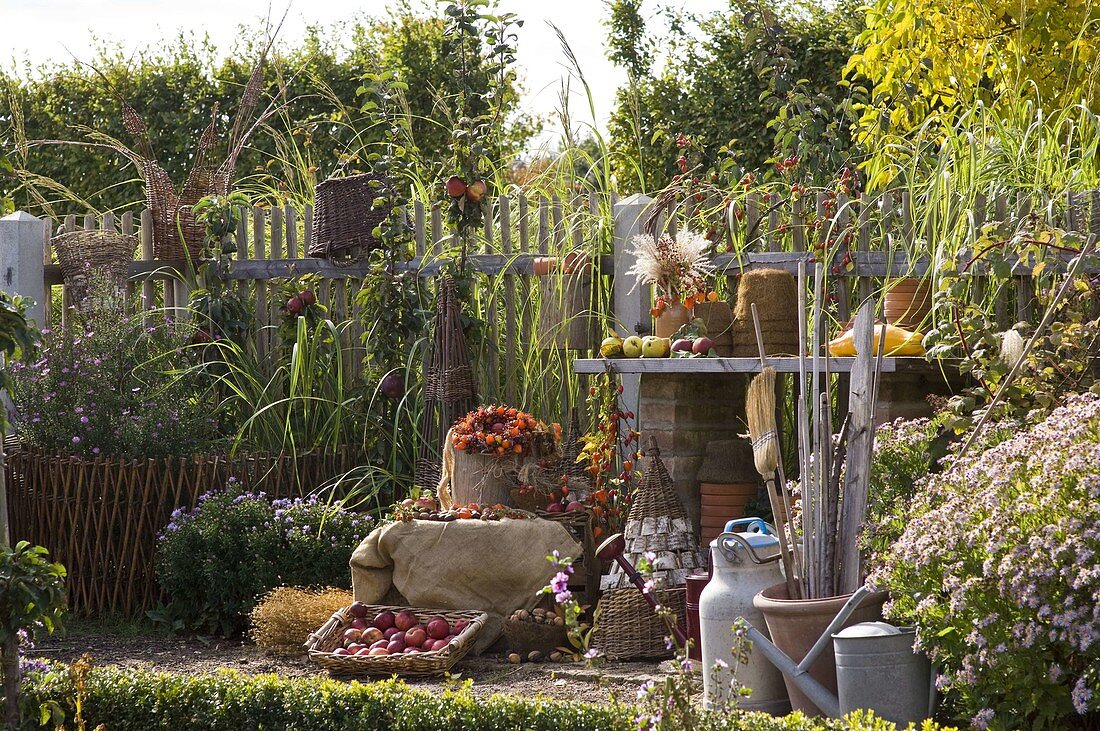 Workplace in the cottage garden decorated in autumn