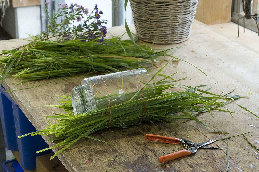 Bouquet of anemones in vase with grass dress (1/2)