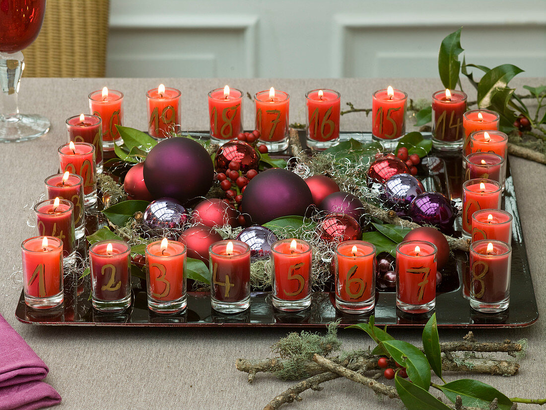 Advent calendar - wreath of 24 numbered candles on tray