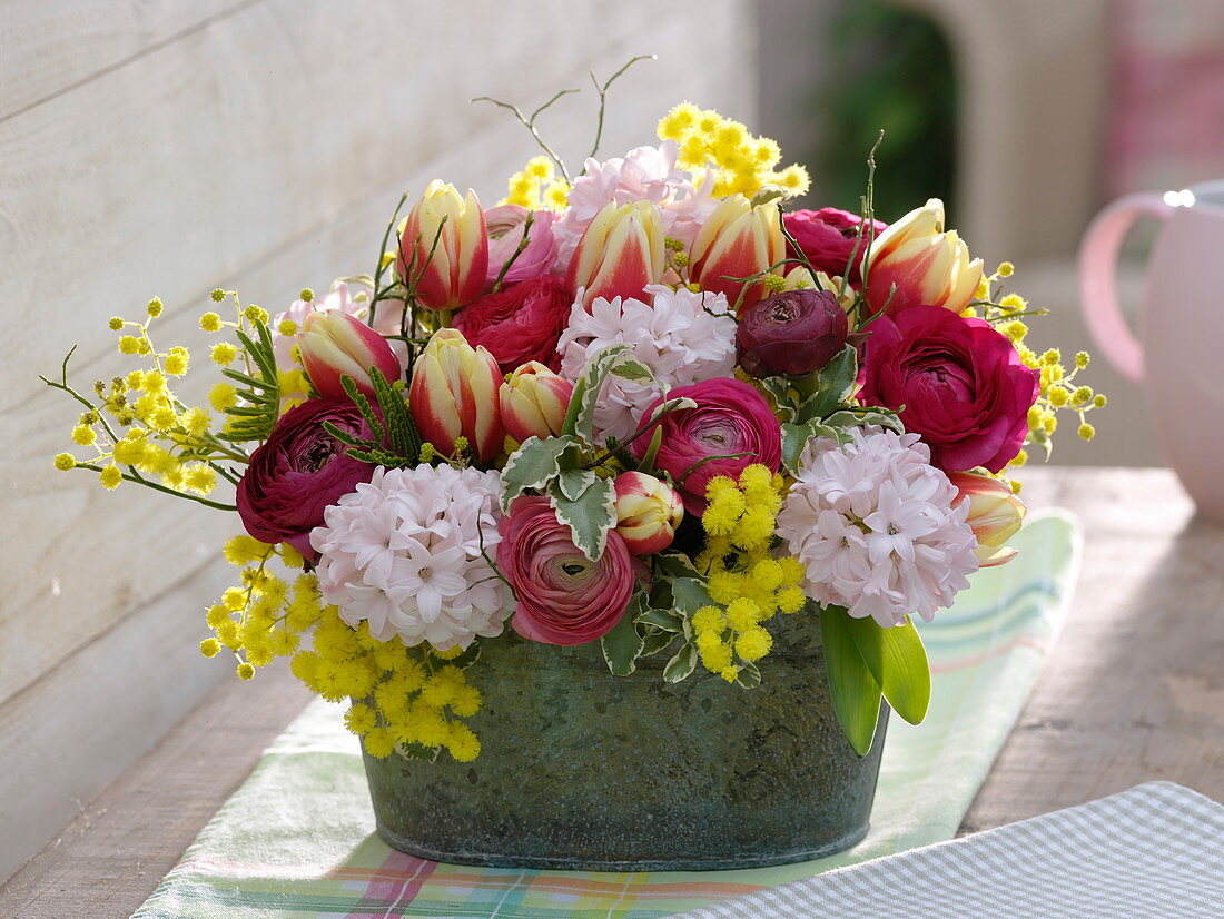 Hyacinthus (hyacinth), Tulipa (tulip), Ranunculus arrangement