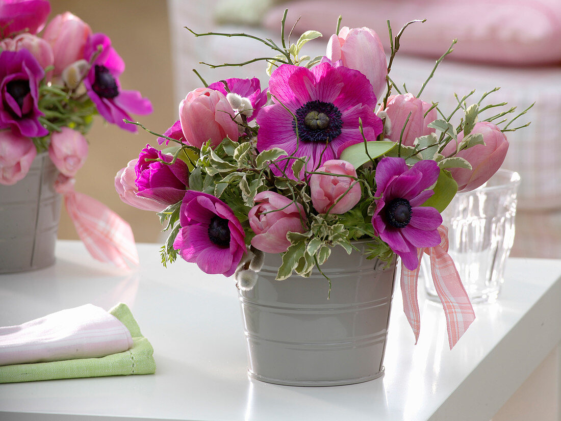 Small bouquet of Anemone coronaria (crown anemone), Tulipa