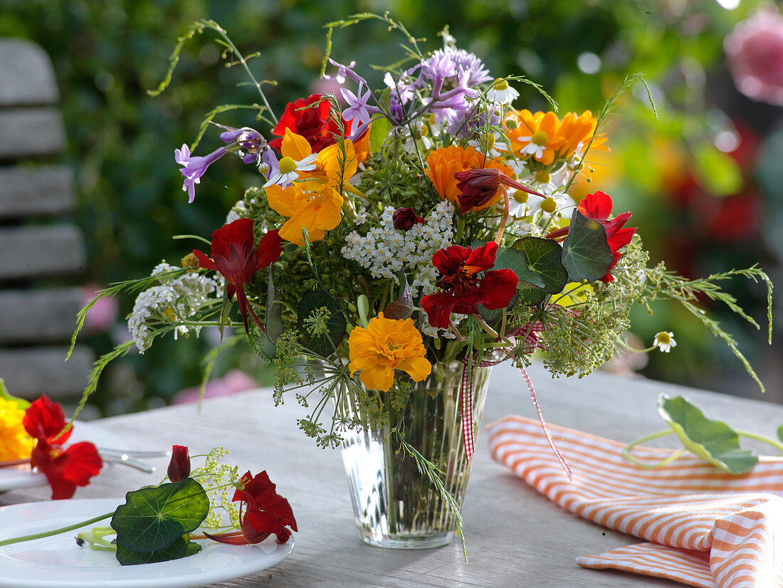 Colorful herb bouquet of Tropaeolum (nasturtium), calendula