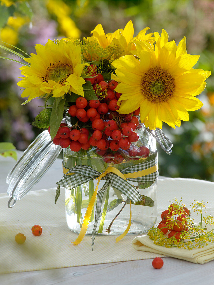 Small late summer bouquet in preserving jar with lid