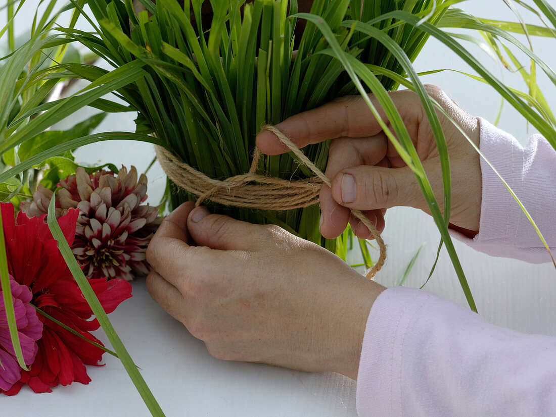 Bouquet in grass sleeves