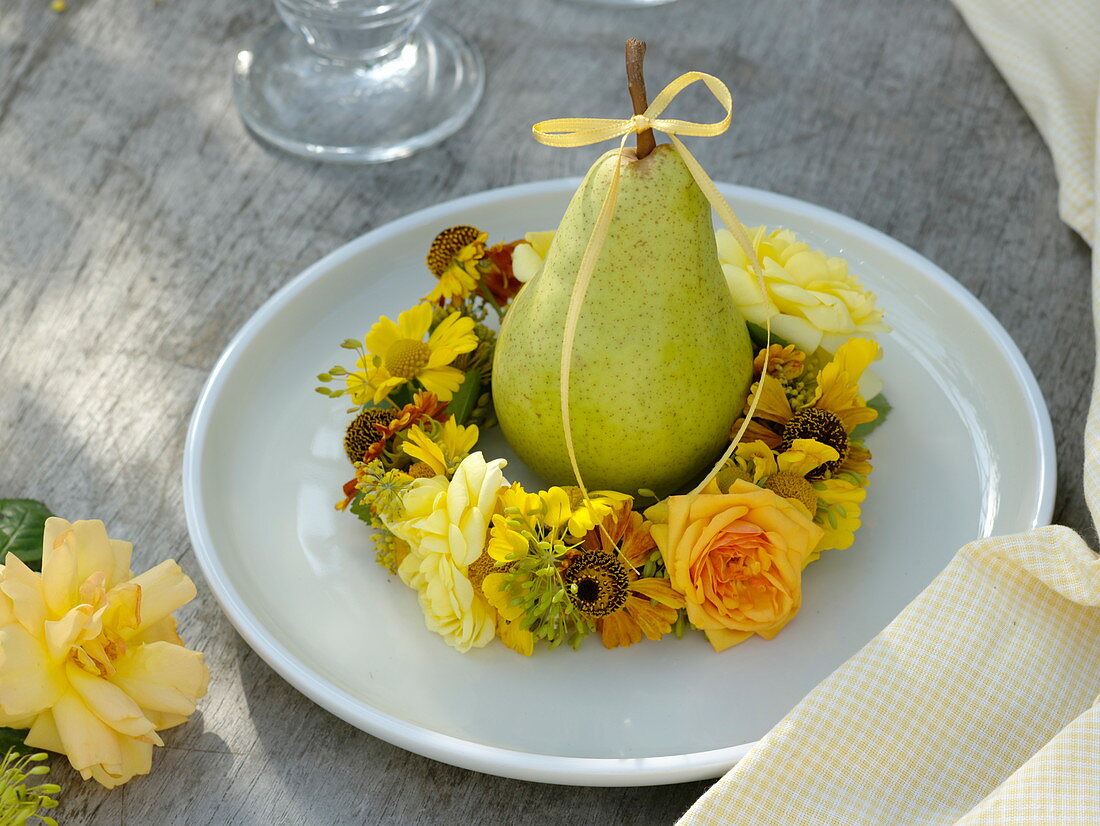 Flower wreath and pear