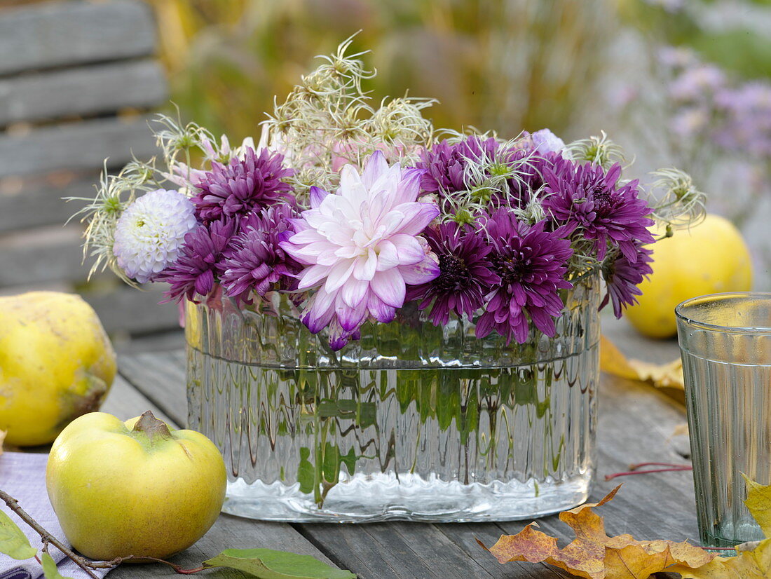 Oval glass with dahlias and woodland vine