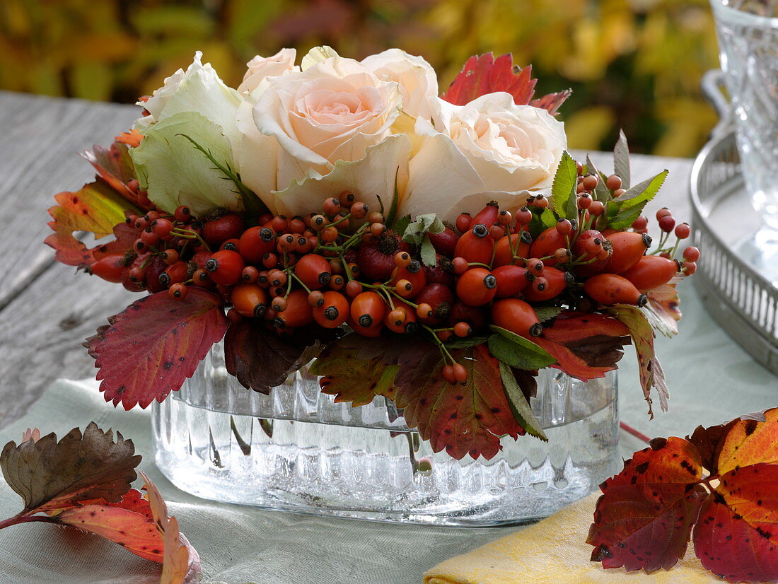 Autumn arrangement in elongated glass bowl