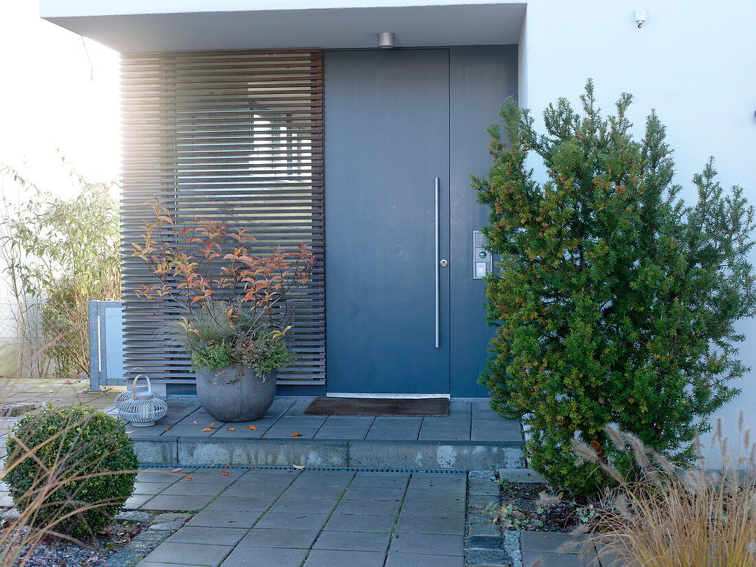 House entrance with modern grey front door