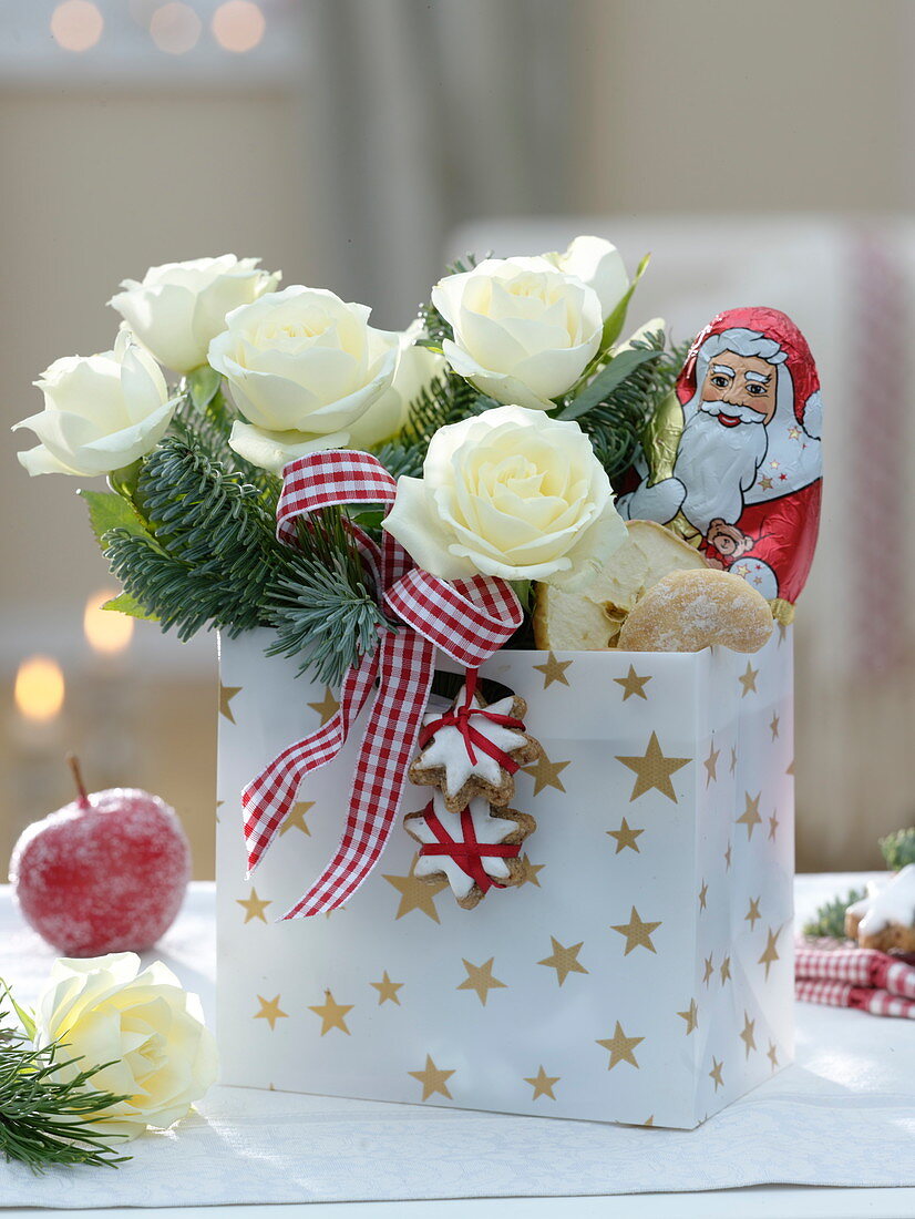 Father Christmas bag with white pinks (roses), Abies procera (Nobilistanne)