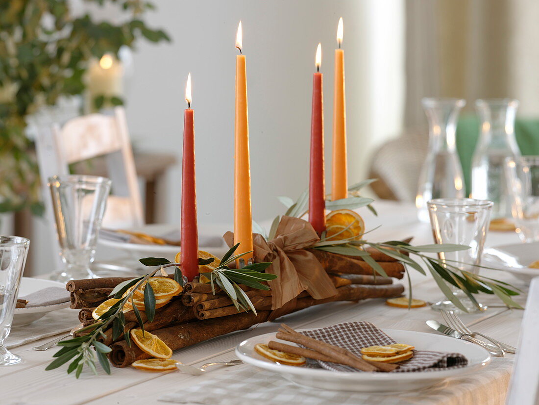 Unusual Advent arrangement of cinnamon sticks