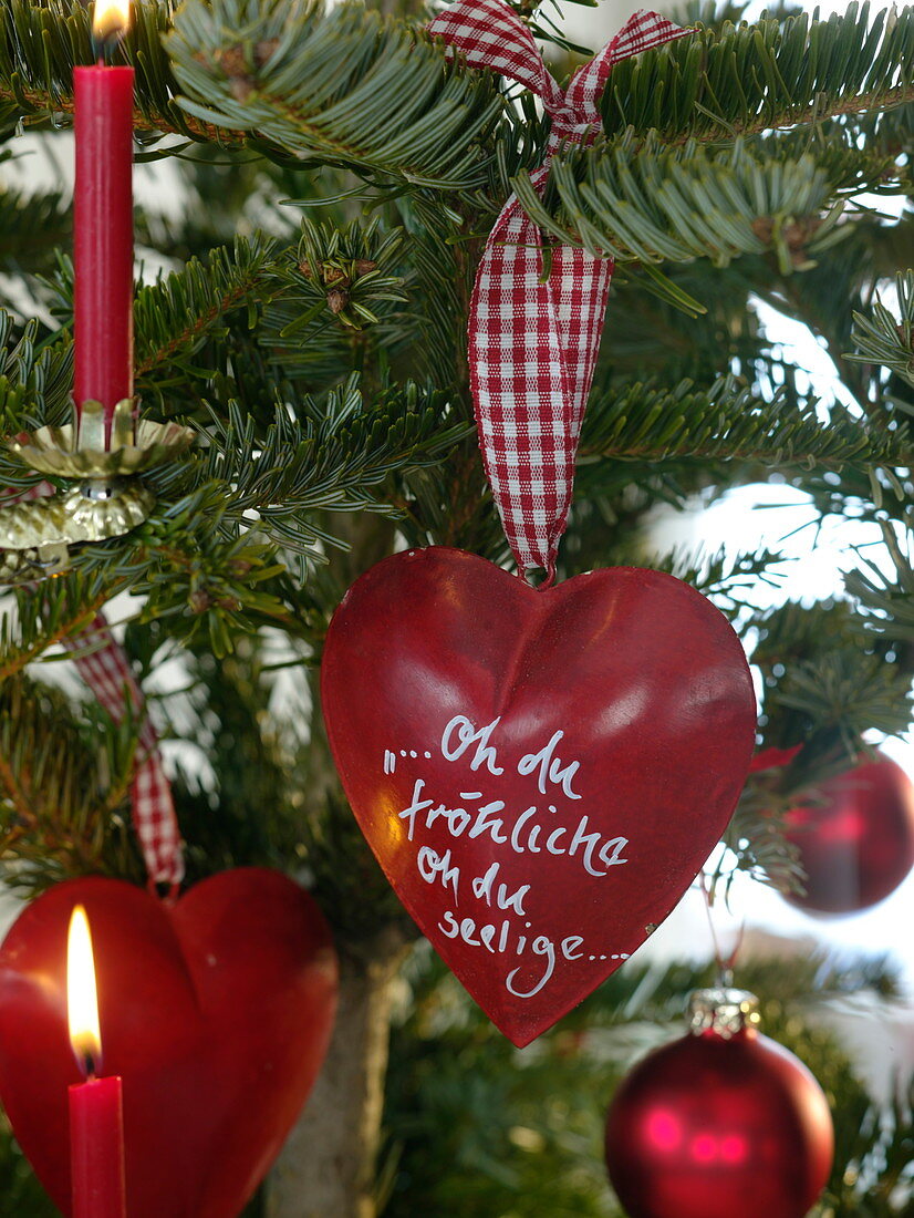 Red metal heart as tree ornament