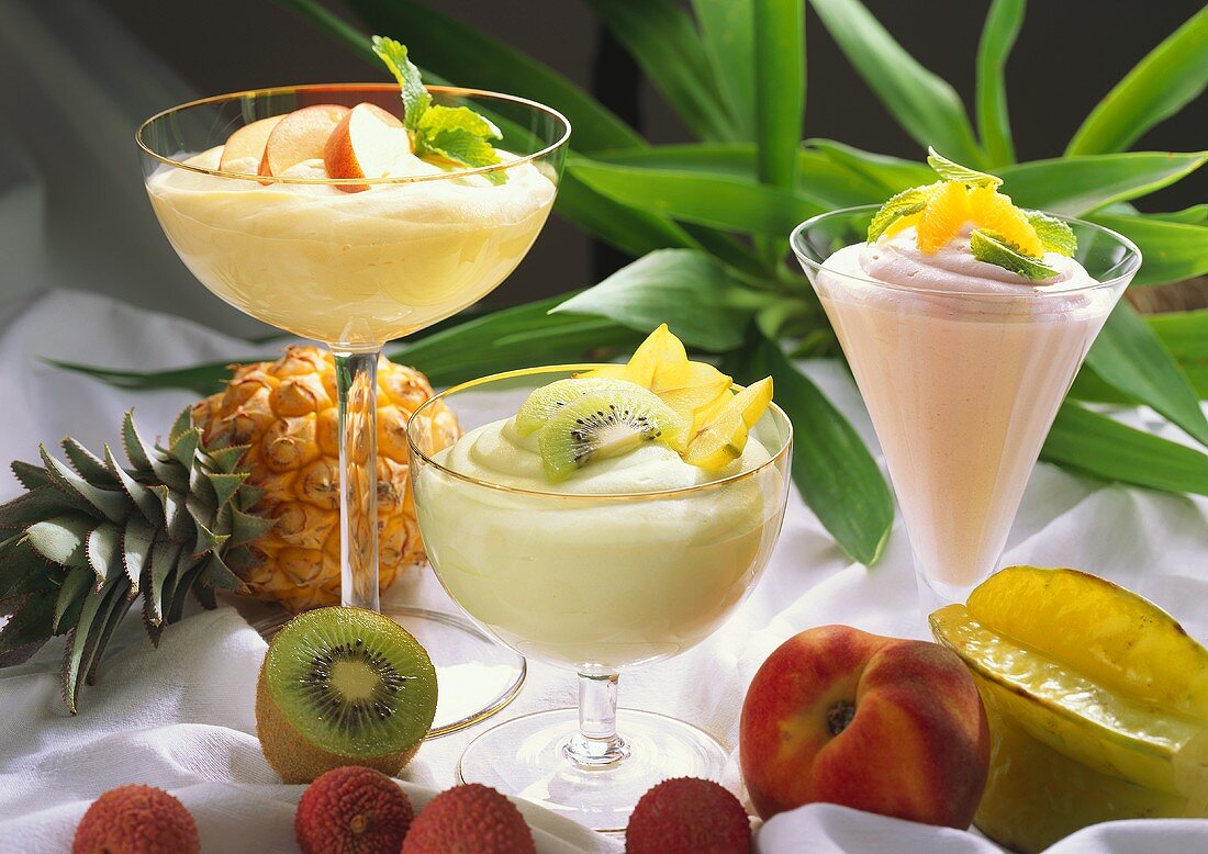 Passion fruit mousse with different fruit slices