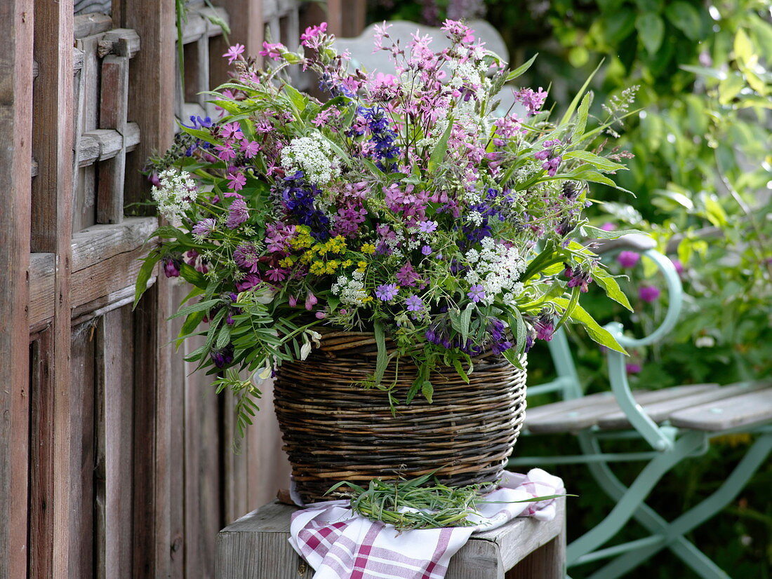 Meadow bouquet in basket vase