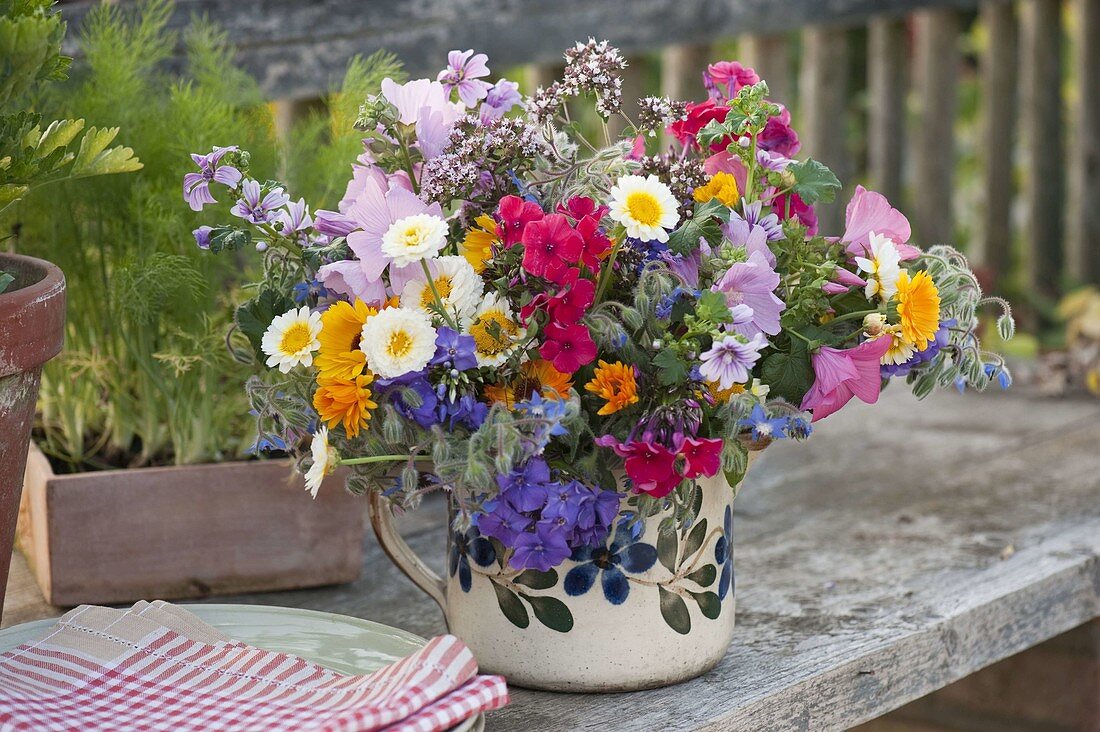 Colourful bouquet of flowers with edible blossoms