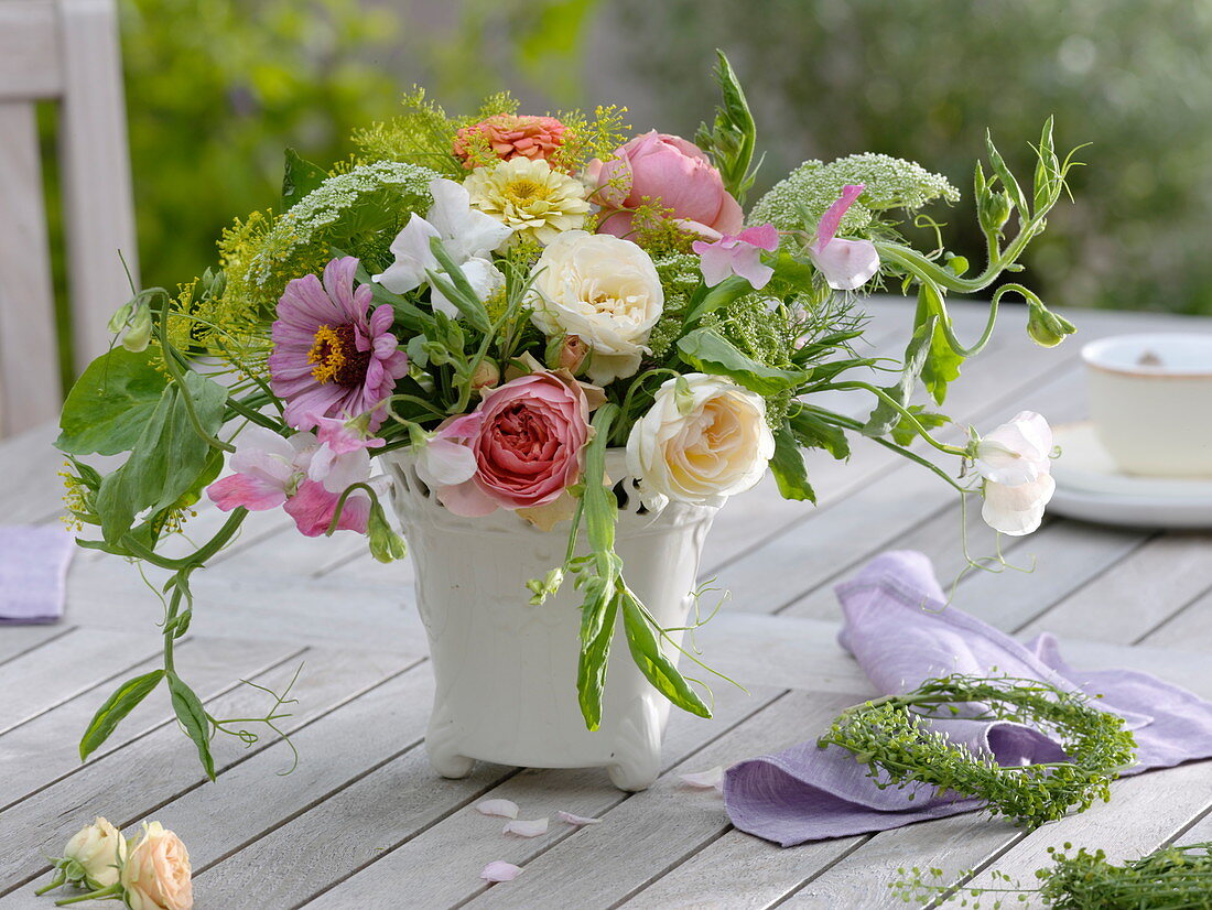 Summer bouquet with Rosa (roses), Lathyrus odoratus (sweet pea), Ammi