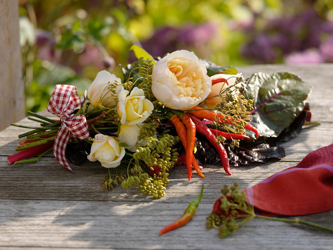 Edible late summer bouquet: pink (roses), chard (Beta vulgaris)