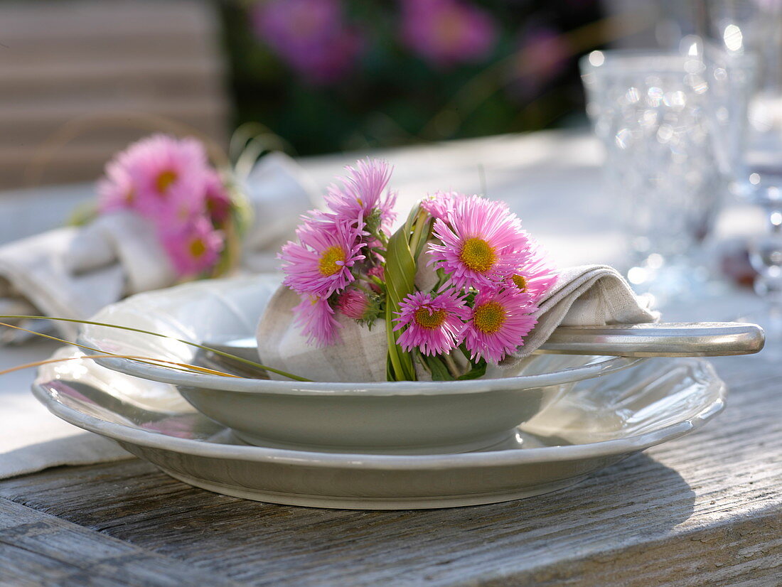 Autumn table decoration with asters and pears