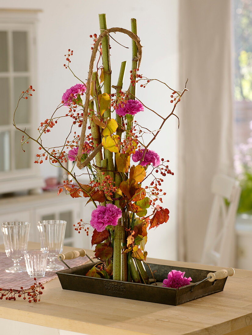 Standing bouquet with Dianthus (carnation), Parthenocissus (wild vine), pinks