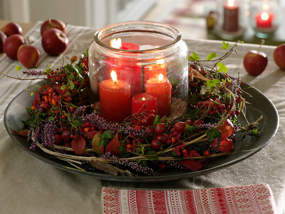 Winding autumn wreath of clematis vines (woodland vine), rose (rose hips)