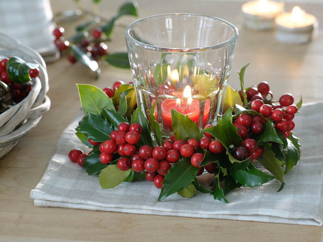 Lantern in a small wreath of Ilex (holly)