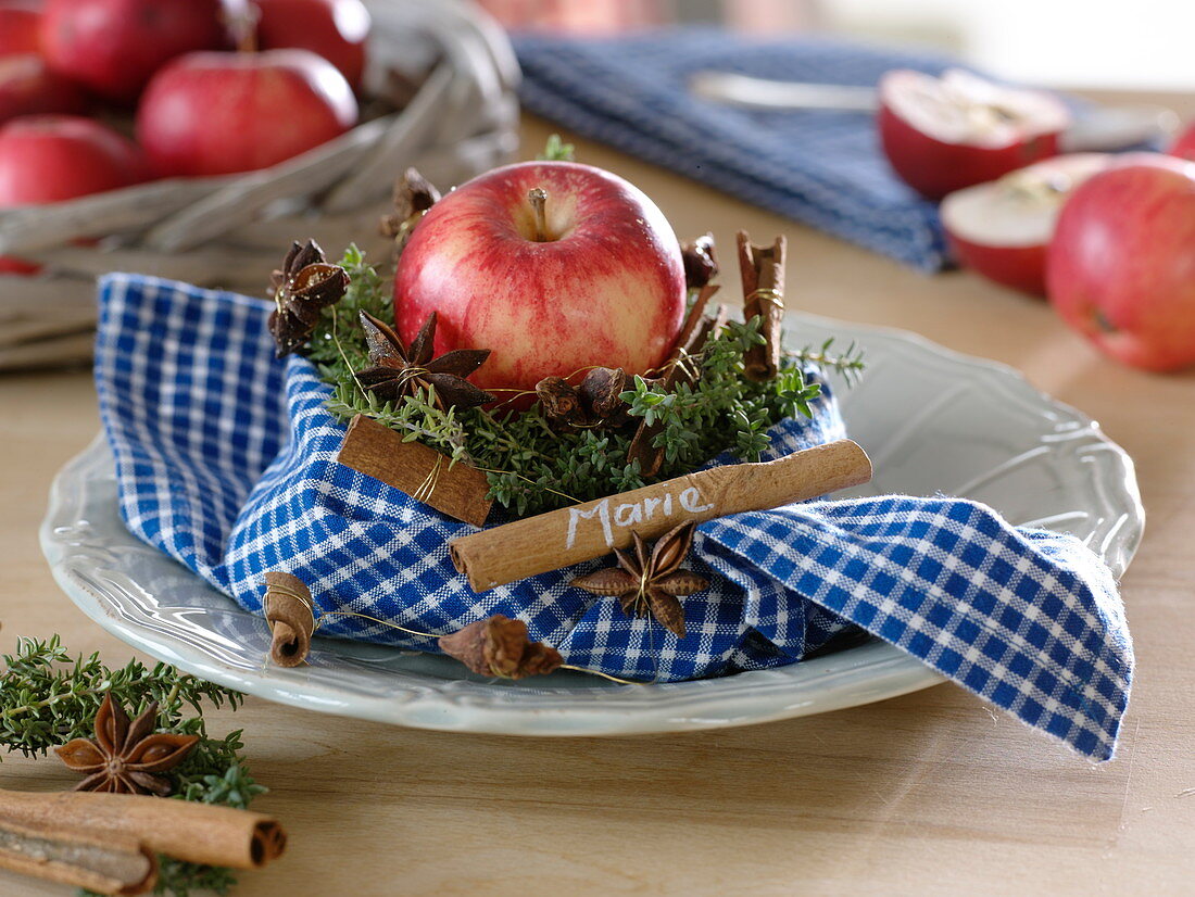 Fragrant plate decoration on blue and white checked napkin