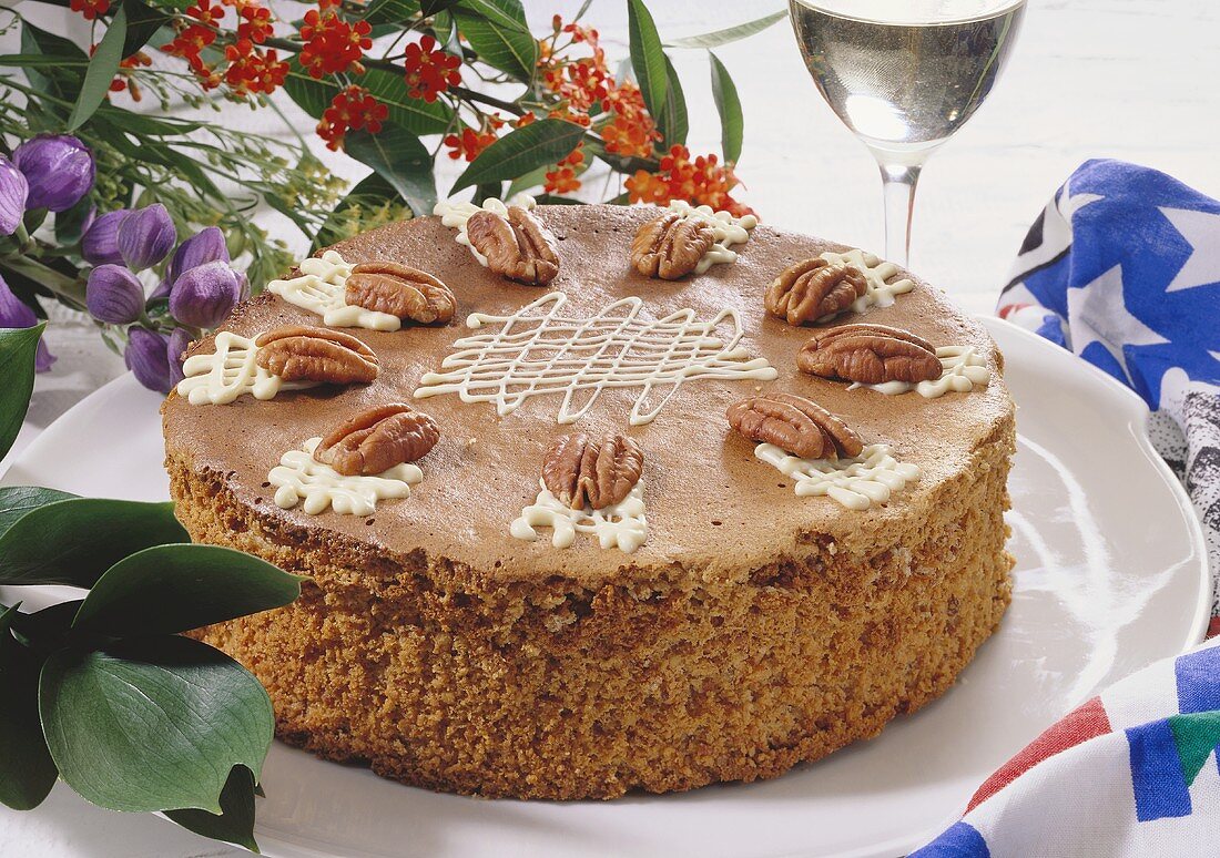 Nut sponge gateau with pecan nuts & white chocolate