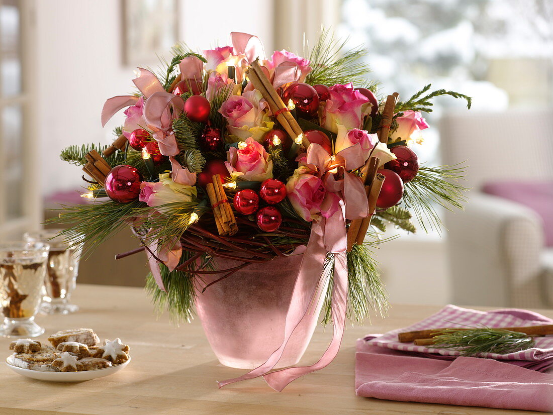 Christmas bouquet of roses, cinnamon sticks, pinus