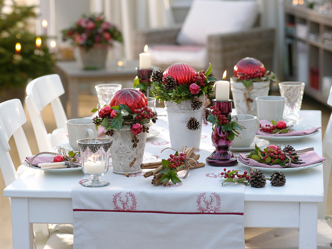 Christmas table decoration with red ball arrangements