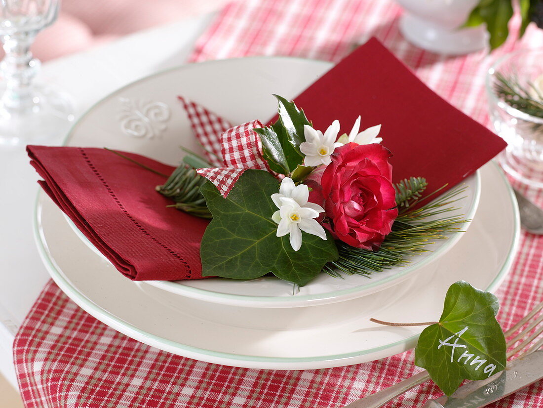 Winter table decoration with red and white scented bouquets