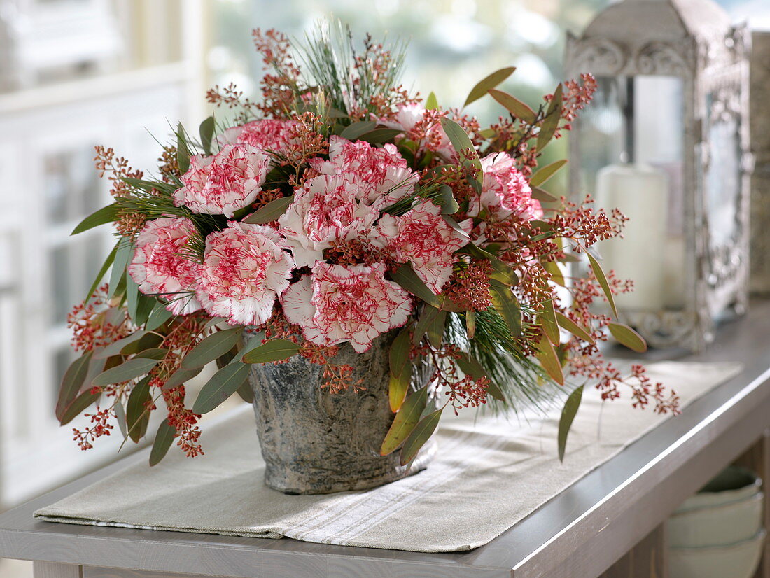 Bouquet of Dianthus 'Arthur' (carnations), Pinus (pine) and Eucalyptus