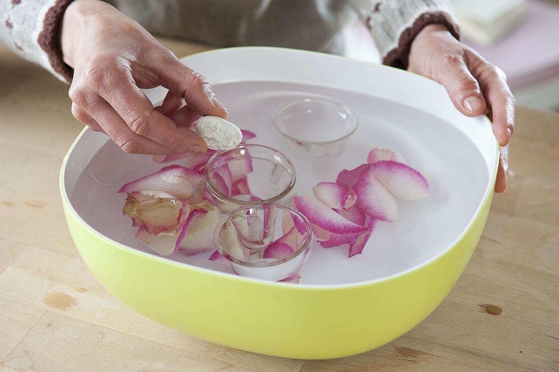 Homemade ice wind lights with rose petals