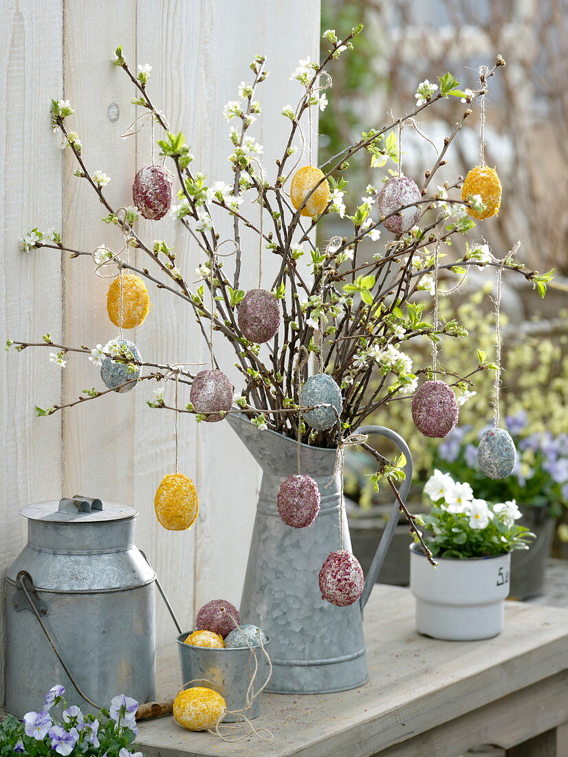 Sticking crushed flowers to easter eggs