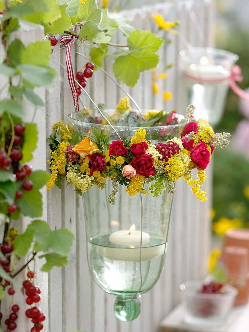 Upside down hanging glass bell as a lantern