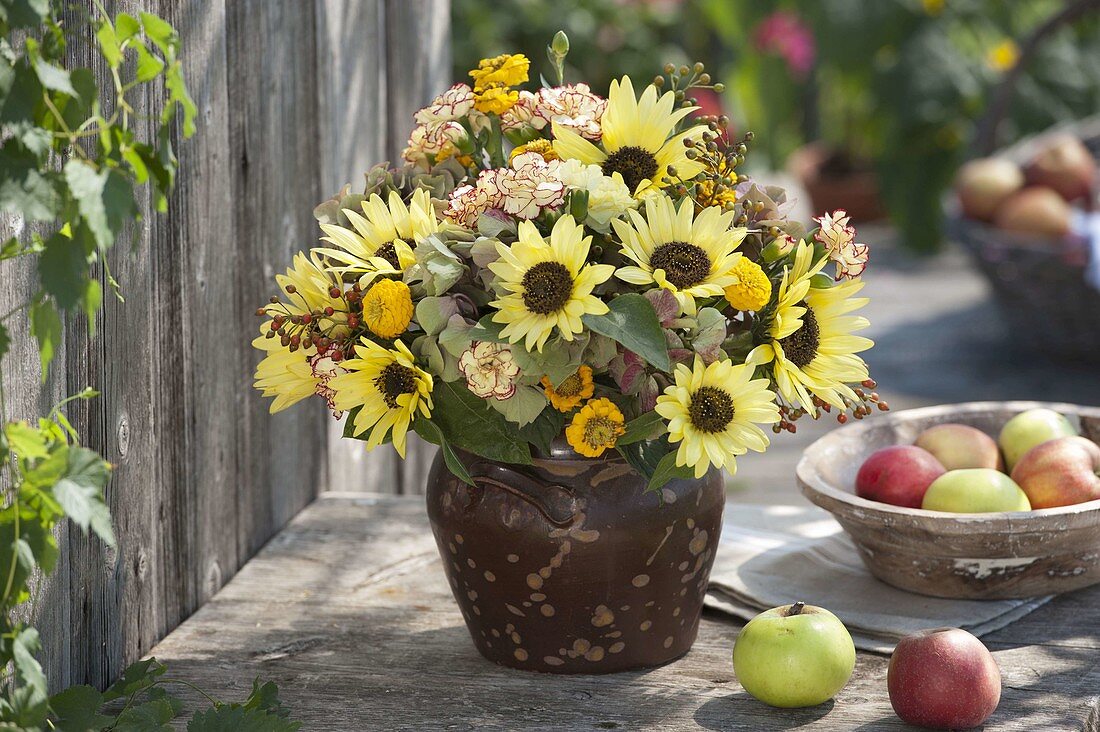 Rural bouquet in brown pot